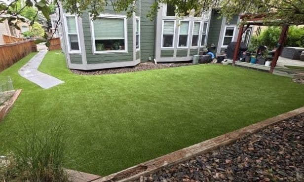 Pet-Friendly Turf Installation Across All 3 Sides of This Backyard image