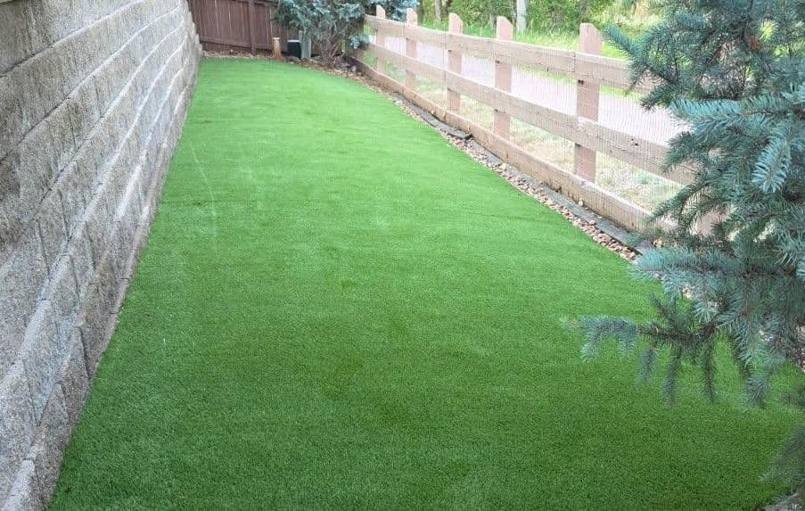 Artificial Turf Turns a Tricky Backyard Tier Into a Pet-Friendly Space image