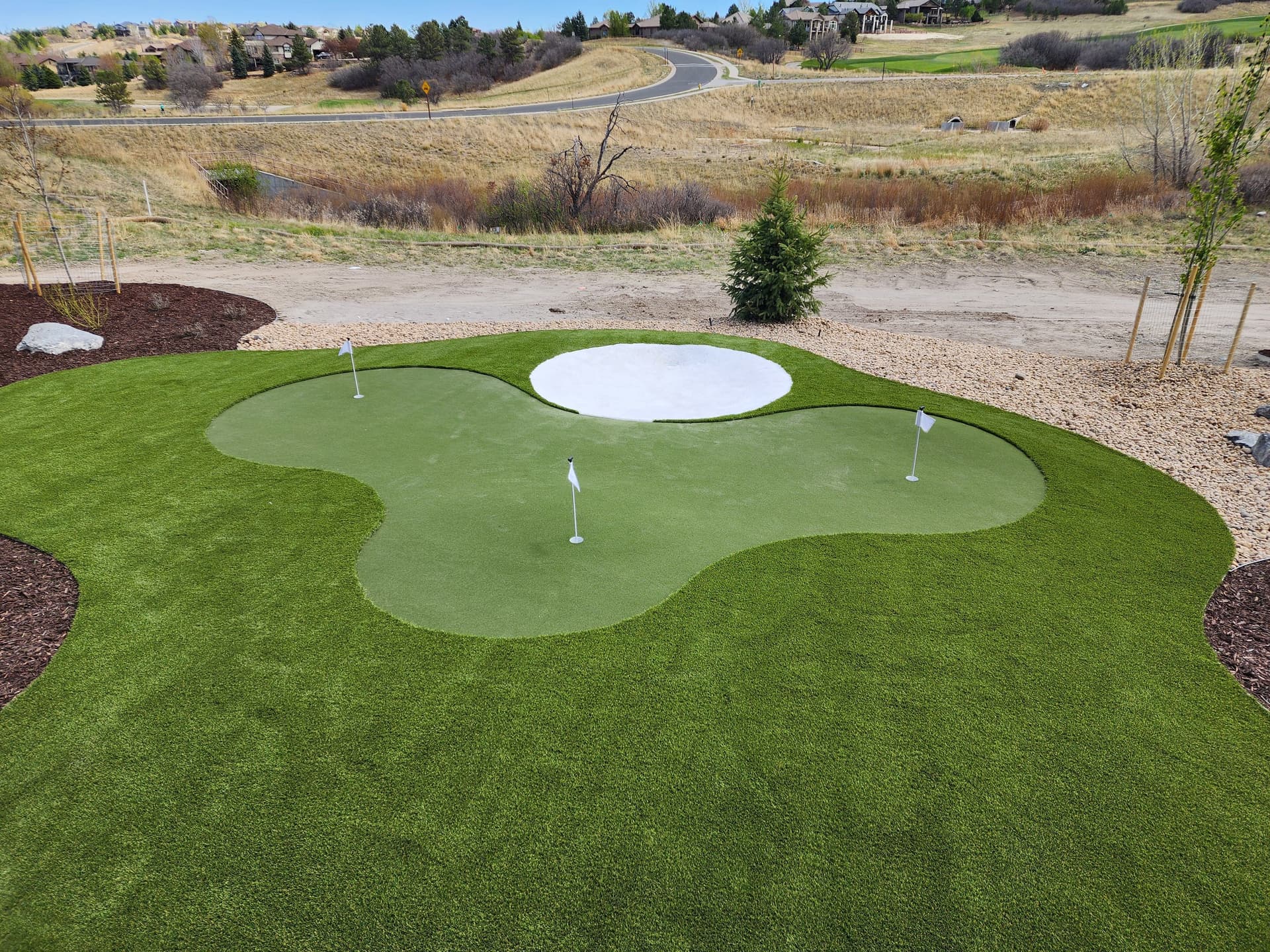 Gallery photos for Custom Backyard Putting Green with Artificial Turf Bunker: Image #2