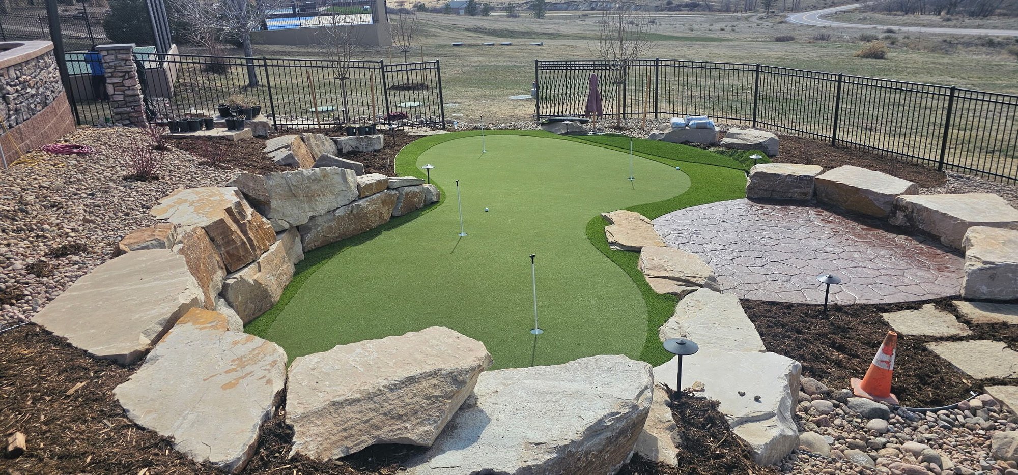 Backyard patio and putting area