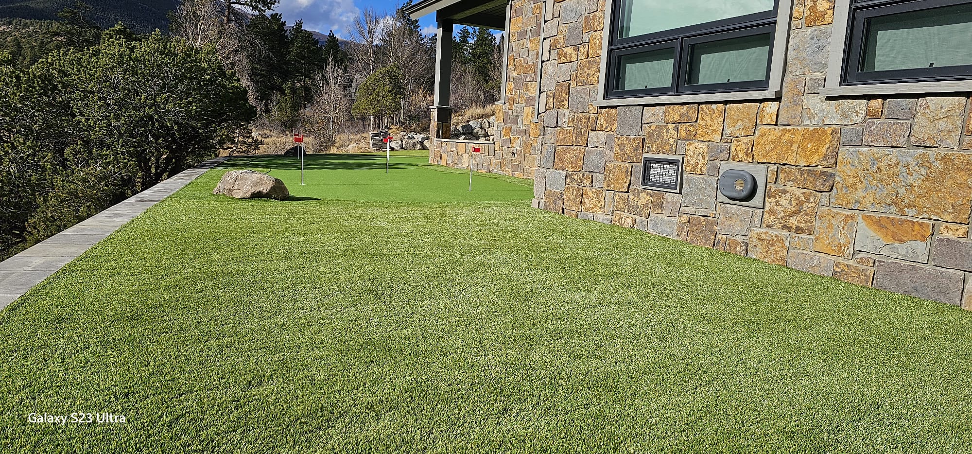 Lawn and putting green for a mountain home